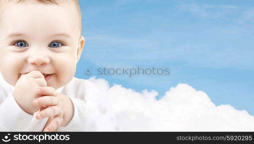 child, happiness and people concept - adorable baby