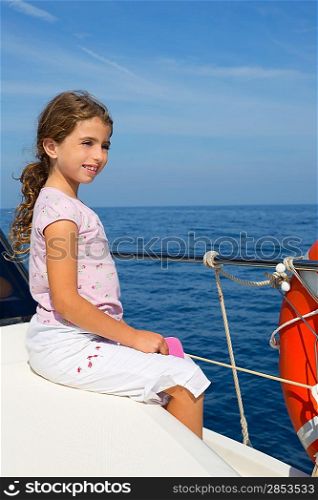 child happy girl sailing happy boat at blue sea ocean