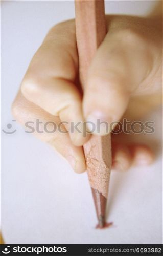Child Holding Colored Pencil