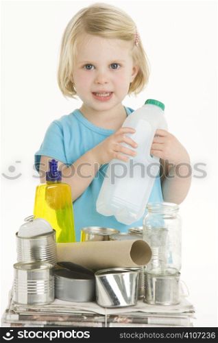 Child Holding Recycling