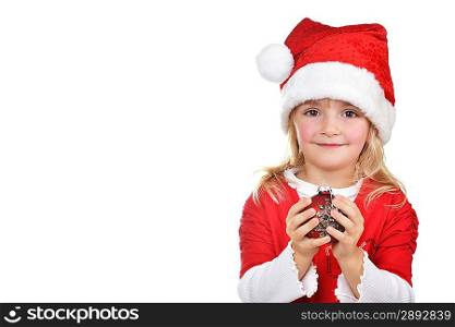 child in santa hat holding christmas decorations in hand