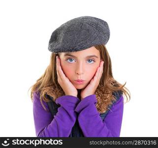 Child kid girl face expression of surprise hands in face on white with winter fashion cap