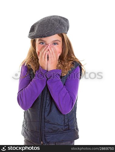 Child kid shy girl smiling hiding her face with hands with winter cap fashion