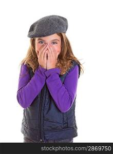 Child kid shy girl smiling hiding her face with hands with winter cap fashion
