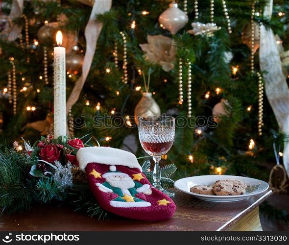 Child-like setting of sherry and cookies with a santa stocking for gifts
