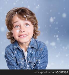 Child looking snow falling with happy face