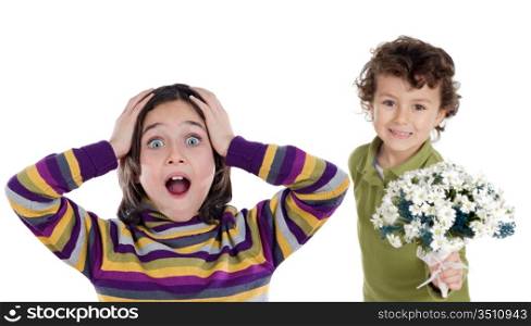 Child offering a bouquet of flowers to a surprised girl