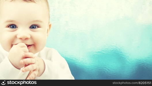 child, people and happiness concept - adorable baby