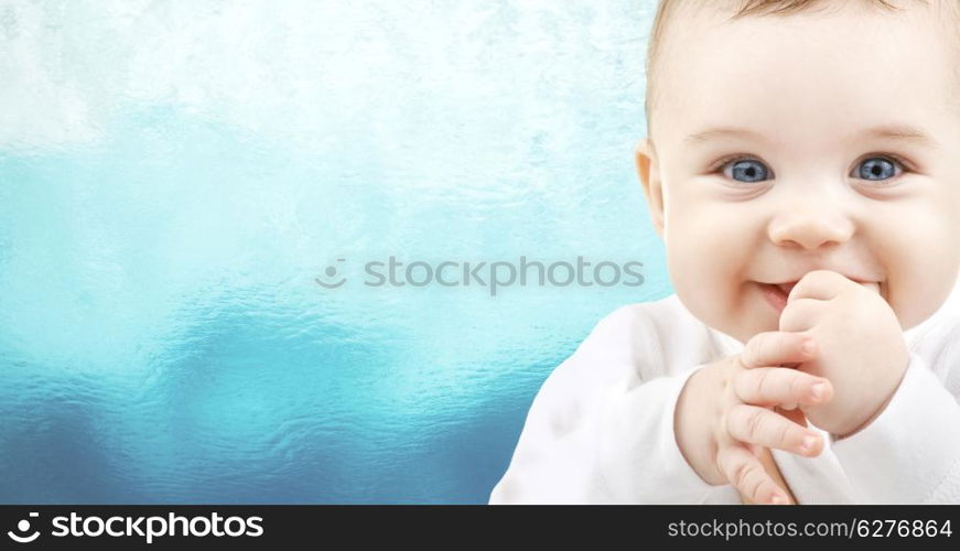 child, people and happiness concept - adorable baby