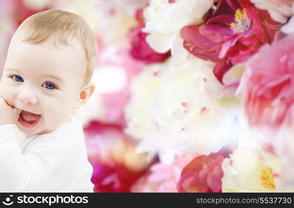 child, people and happiness concept - adorable baby boy