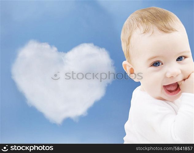 child, people and happiness concept - adorable baby boy