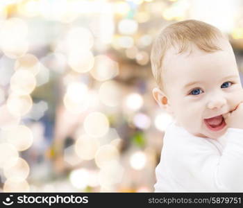 child, people and happiness concept - adorable baby boy