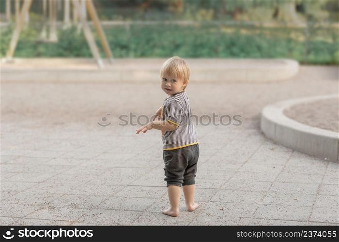 Child play on playground, blurry background