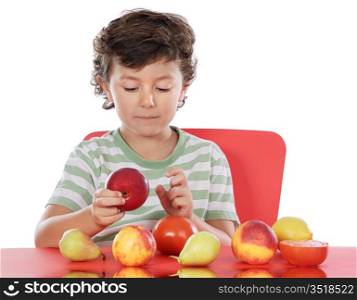 child playing with fruits a over white background