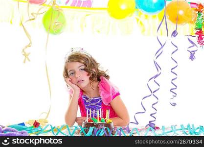 child sad kid crown princess in birthday party bored gesture and chocolate cake