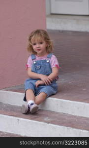 Child sitting on stairs