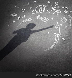 Child space dream as a childhood imagination concept with a cast shadow of a kid dreaming of being an astronaut or astronomy explorer with chalk drawings of a rocket spacecraft planets stars and a flying saucer.