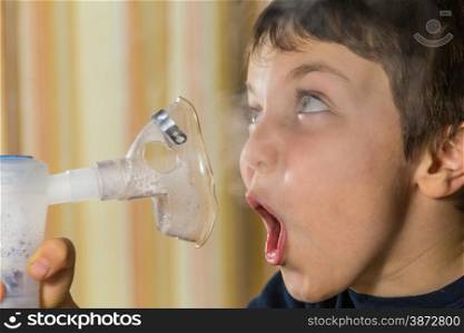 child taking respiratory, inhalation therapy