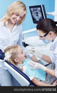 Child treated teeth in the dental clinic