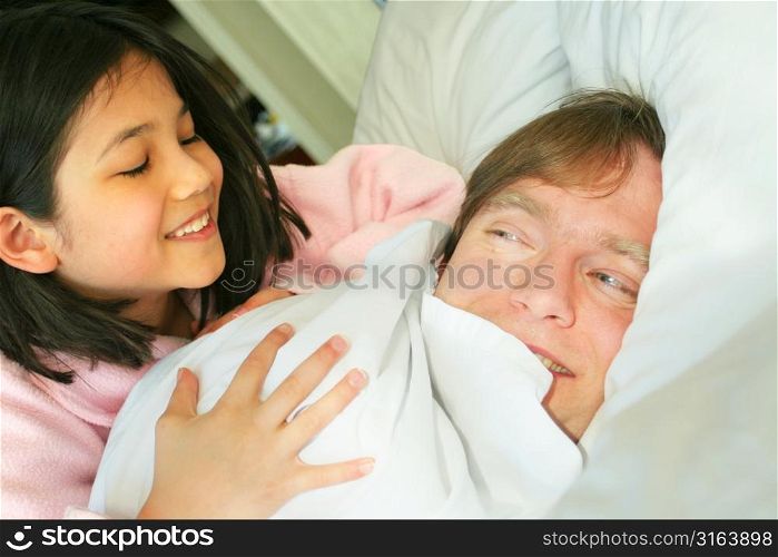Child waking parent in bed