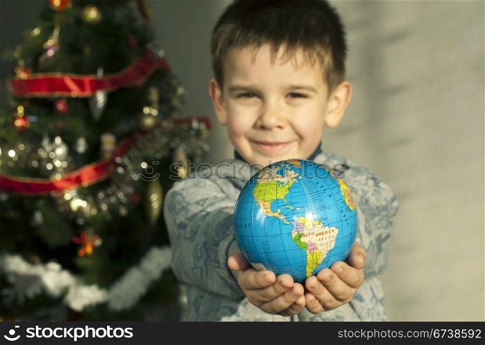 Child who give as gift the world on Christmas.