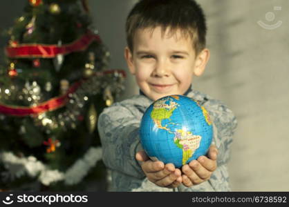 Child who give as gift the world on Christmas.