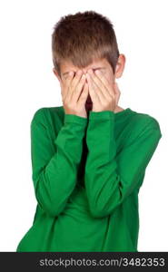 Child with green t-shirt covering his face isolated on white background