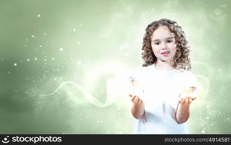 Child with magic light. Little girl with magic lights and shining around