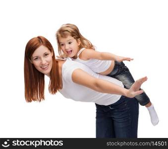 childhood and parenting concept - happy mother and child doing piggy back