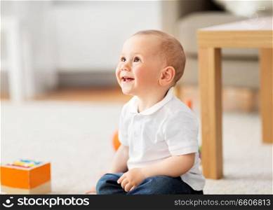 childhood and people concept - little baby boy at home. little baby boy at home