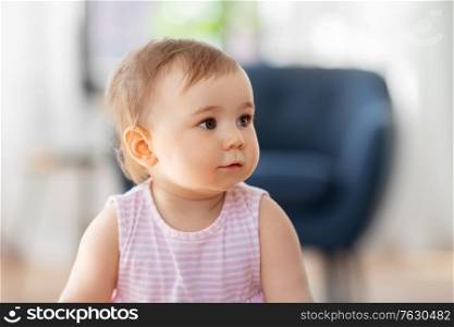 childhood and people concept - portrait of little baby girl at home. portrait of little baby girl at home