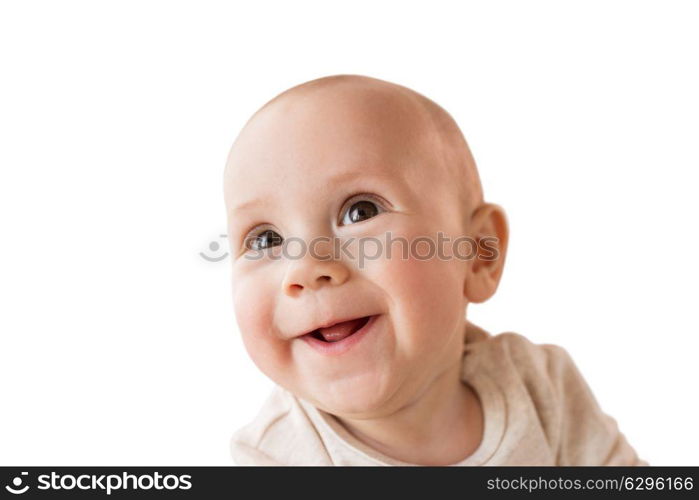 childhood, babyhood and people concept - close up of happy little baby boy face. close up of happy little baby boy face