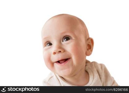 childhood, babyhood and people concept - close up of happy little baby boy face. close up of happy little baby boy face