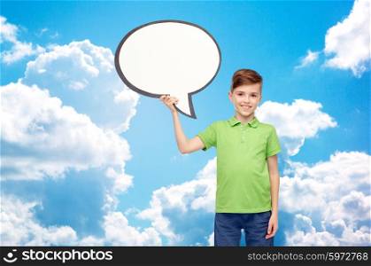 childhood, communication, advertisement and people concept - happy smiling boy in green polo t-shirt holding blank white text bubble banner over blue sky and clouds background