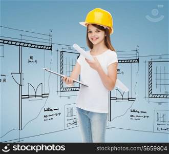 childhood, construction, architecture and people concept - smiling little girl in protective helmet with clipboard and blueprint