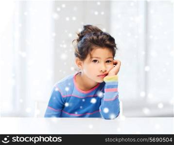 childhood, emotions and people concept - sad or tired little girl indoors