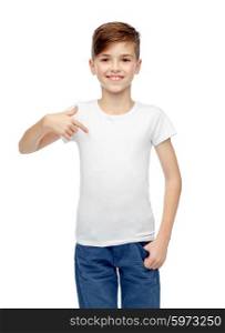 childhood, fashion, advertisement and people concept - happy boy in white t-shirt and jeans pointing finger to himself