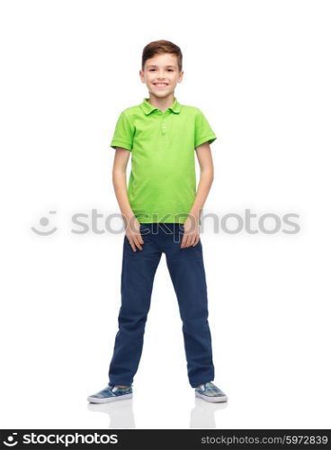 childhood, fashion and people concept - happy smiling boy in green polo t-shirt