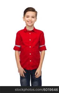 childhood, fashion and people concept - happy smiling boy in red shirt