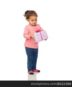 childhood, fashion, birthday, holidays and people concept - beautiful little african american baby girl with gift box