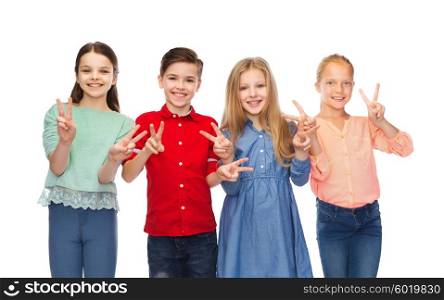 childhood, fashion, friendship and people concept - happy smiling boy and girls showing peace hand sign
