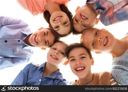 childhood, fashion, friendship and people concept - happy smiling children faces