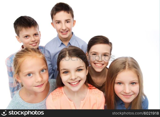 childhood, fashion, friendship and people concept - happy smiling children faces