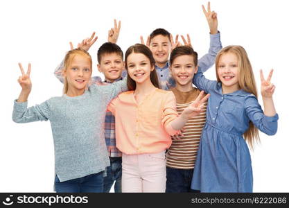 childhood, fashion, friendship and people concept - happy smiling children showing peace hand sign