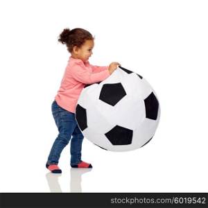 childhood, game, football and people concept - happy african american little baby girl playing with ball