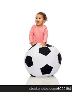 childhood, game, sport, football and people concept - happy african american little baby girl playing with ball