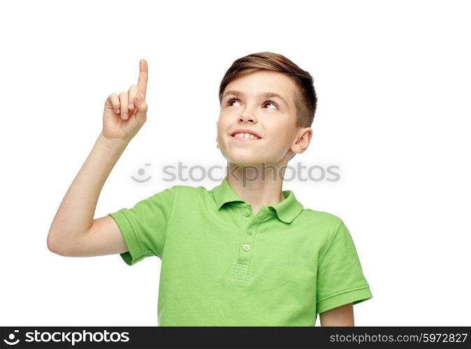 childhood, idea, inspiration and people concept - happy smiling boy in green polo t-shirt pointing finger up