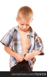 Childhood independence concept ,little boy buttoning on shirt, fastening his buttons , isolated on white background