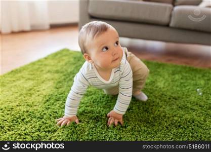childhood, kids and people concept - lovely baby boy at home. lovely baby boy at home