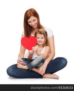 childhood, parenting and relationship concept - happy mother with adorable little girl and red heart